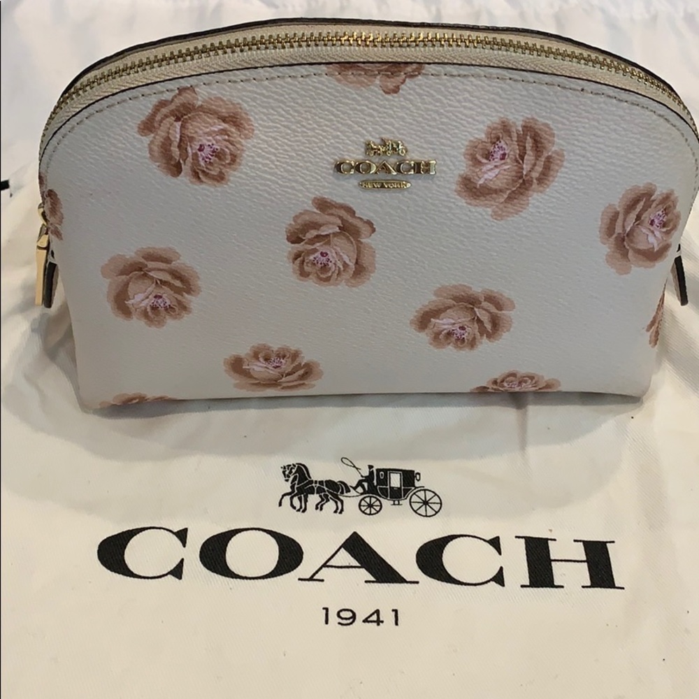 Coach cosmetic case chalk/ rose print